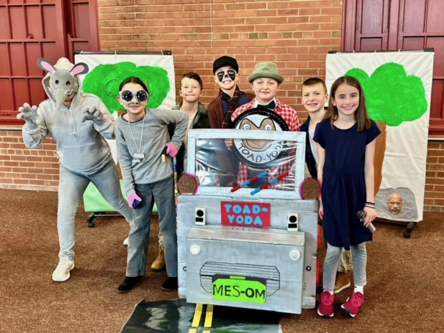 The MES Odyssey of the Mind team in their costumes for their skit at State Competition