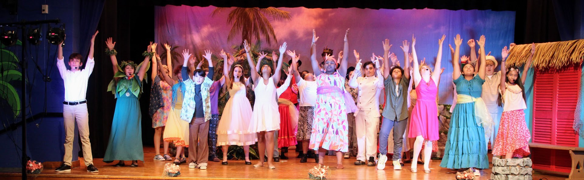 VCMS drama club on stage performing "Once on this Island Jr."