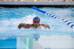 Girl swimming in a lap pool