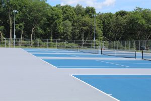 The High School tennis courts were resurfaced.