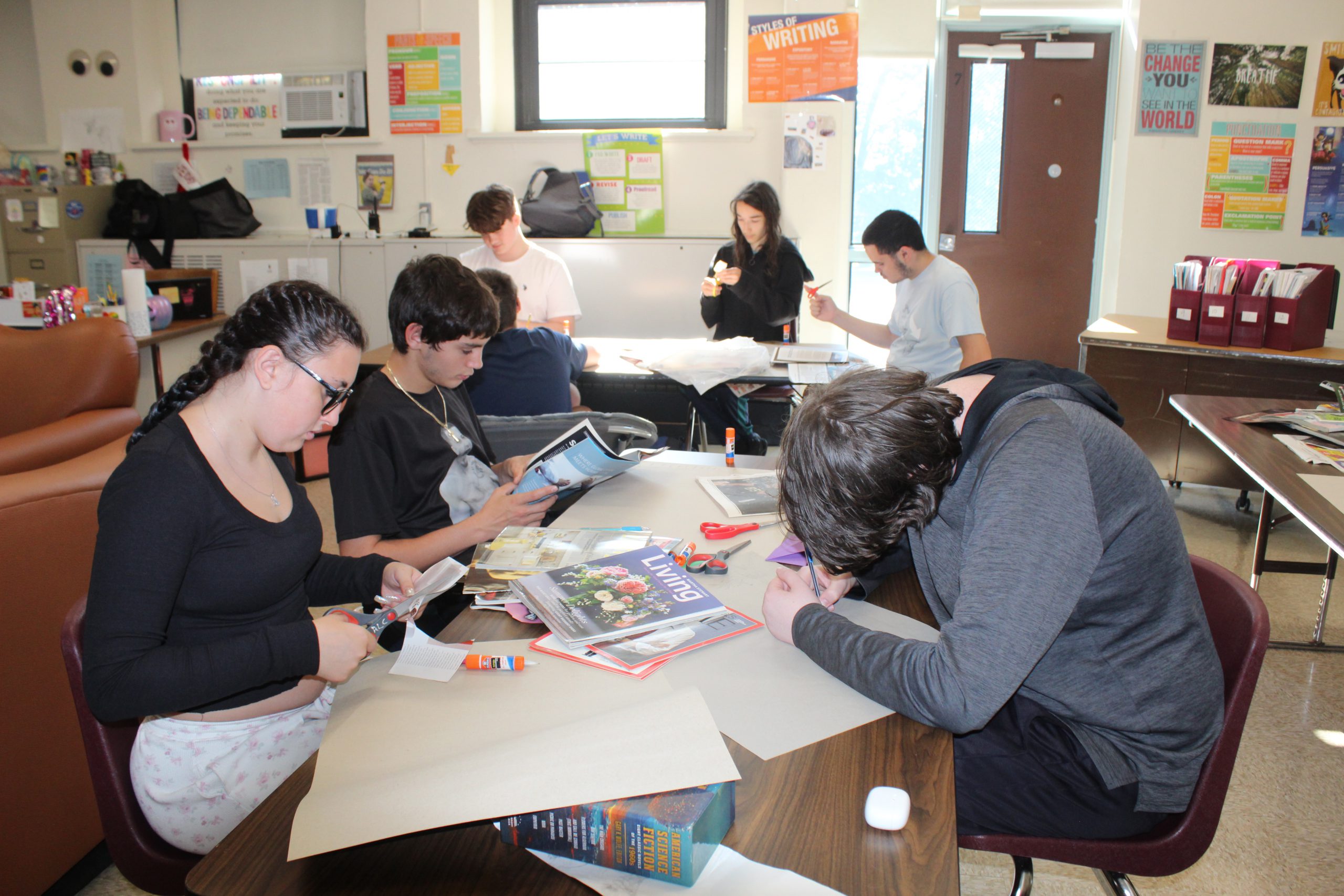 Students working at long tables.