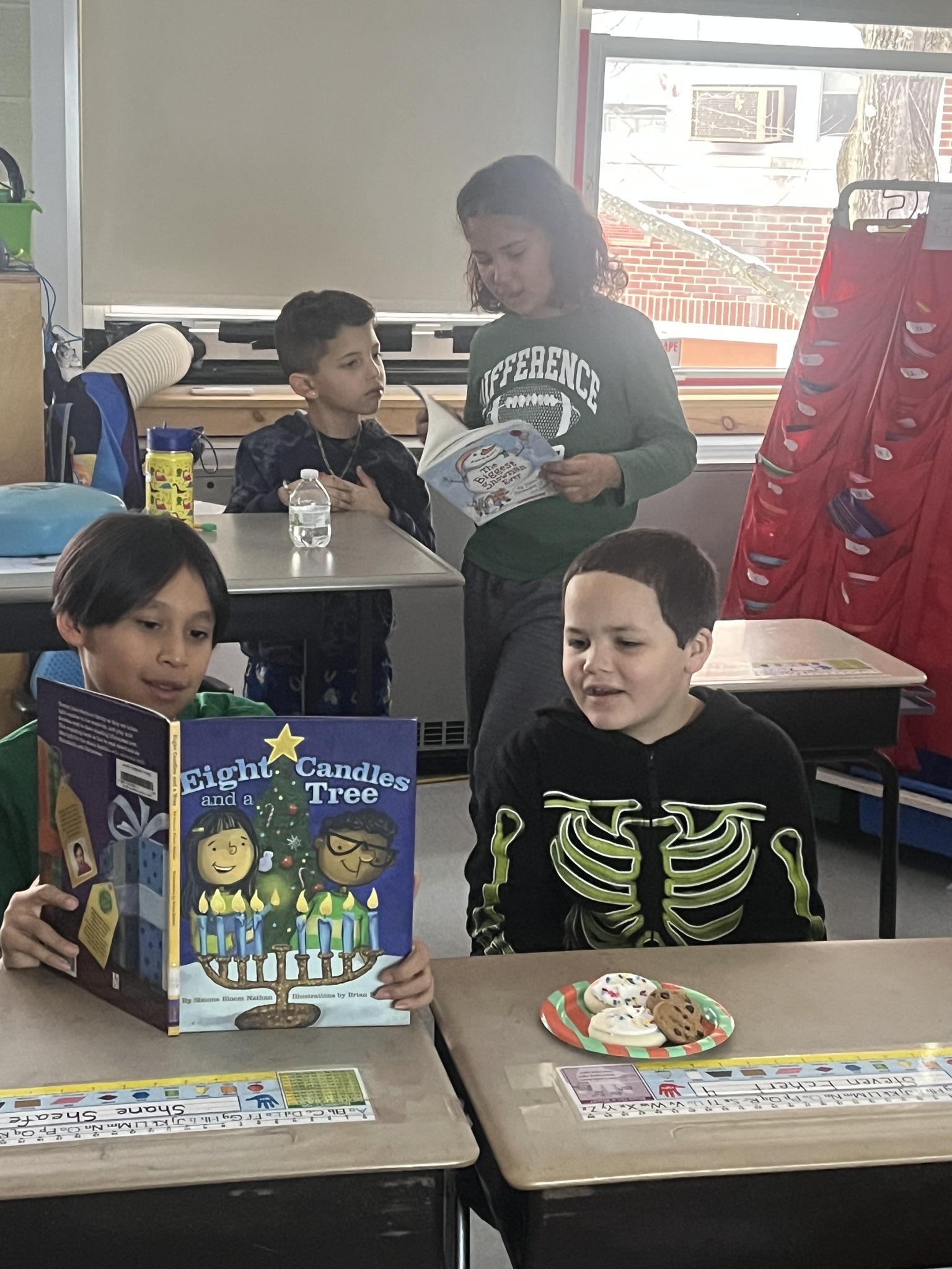 Two students reading together at WES.